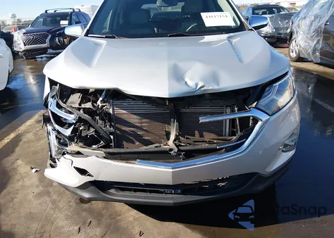 2018 Chevrolet Equinox Premier z USA, uszkodzony, nr VIN 2GNAXMEV3J6203900